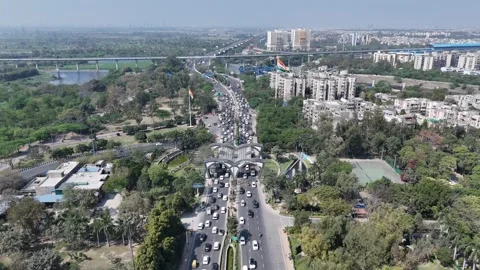 Aerial drone shot of Noida Gate at Delhi Noida border in India Stock Footage 330239761