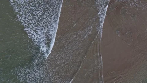 Aerial Drone Shot of Ocean Waves Rolling Onto Sandy Spanish Point Beach, County Stock Footage 338037972
