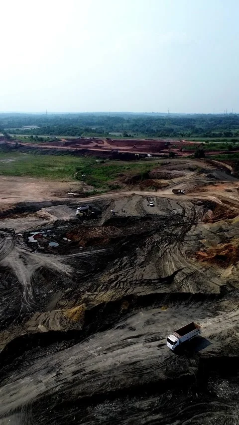 Aerial drone shot open pit mining earthwork construction Stock Footage 346423712