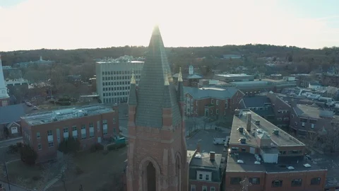 Aerial Drone Shot Orbiting a Brick Church Steeple in Suburban Boston Video stock 122158688