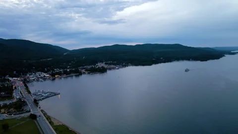 Aerial Drone Shot Orbiting Over Lake George New York at Dusk – 4K 30fps Stock-Footage 318859178
