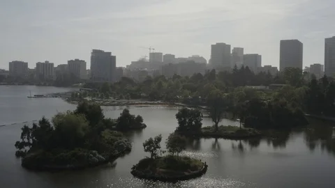 Aerial Drone Shot Over Lake Merritt Of Downtown Oakland Skyline Stock Footage