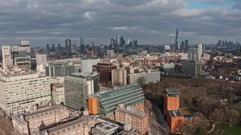 Aerial drone shot over Lambeth Waterloo station towards City of London Stock Footage 149098306