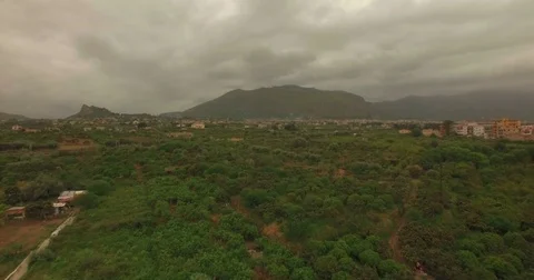 Aerial drone shot over Palermo moving towards Mountains Stock Footage 76943152