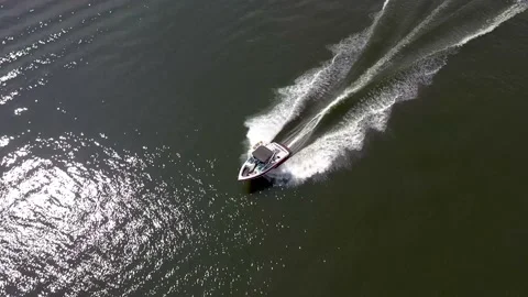 Aerial Drone Shot Over Small Speed Boat And Wake Moving Fast In River. 4K | HD Stock Footage 202017134