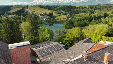 Aerial drone shot over the town of Neufelden in Austria, with a yellow Stock-Footage 345918005