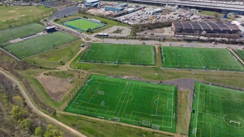 Aerial Drone shot overhead of pristine soccer fields Stock Footage 270817577