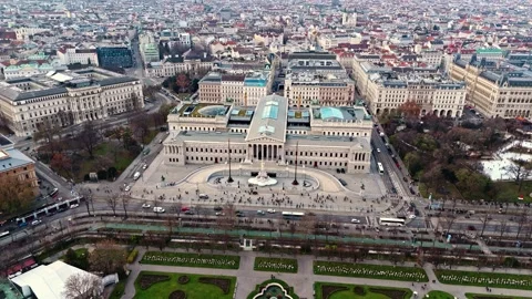 Aerial drone shot panning right of Austrian parliament building and Vienna Stock-Footage 324800249