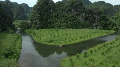 Aerial drone shot of panoramic view of unique landscape in Ninh Binh Stock Footage 166544990