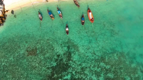 Aerial Drone Shot Passing Over beautiful sea waving  to  the beach. Stock Footage 89580650