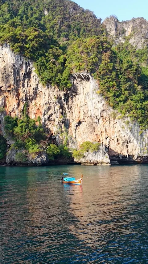 Aerial Drone Shot of Phi Phi Island’s Monkey Beach with Traditional Thai 스톡 동영상 331010849