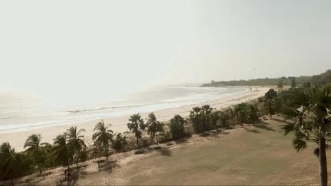 Aerial drone shot of pristine Cap Skirring beach in Casamance, Senegal Stock Footage 309913345