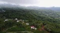 Aerial drone shot raining season in urban forest landscape of Flores - Indonesia 4k or 4k+ Resolution