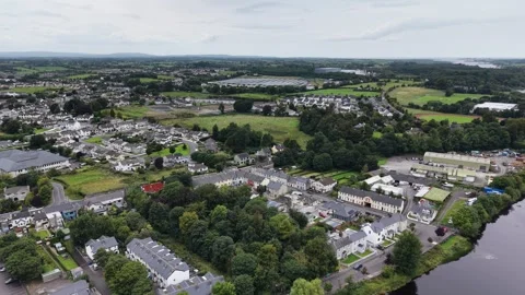 Aerial drone shot on the river Mony in the centre of Ballina, county Mayo. Stock Footage 343737341