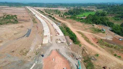 Aerial drone shot road construction concrete highway project Video stock 346423834