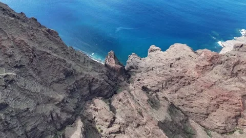 Aerial drone shot of Roque de los Marroyos cliffs on La Gomera island Stock Footage 338420973