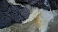 Aerial drone shot rough waterfall straight down Bali Tenegungan 4k or 4k+ Resolution