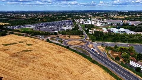 Aerial Drone Shot of Roundabout, Fields, and Industrial Zone Near Nantes, France Stock-Footage 341538142
