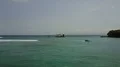 Aerial drone shot seascape follow ferry leaving Bali Padang Bai 4k or 4k+ Resolution