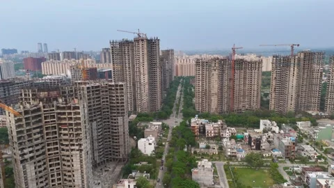 Aerial drone shot showcasing multiple towers under development in a construction Vídeos de archivo 312488997