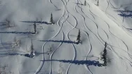 Aerial Drone Shot Ski Trail Of Snowy Mountain Slope Stock Footage