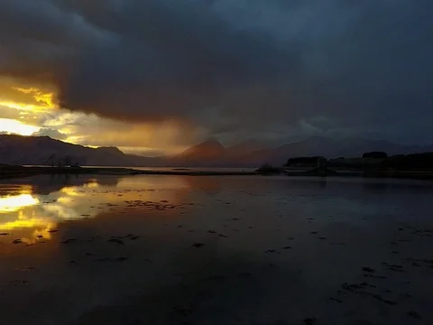 Aerial Drone Shot of Sunset at Castle Stalker Stock Footage 80889241
