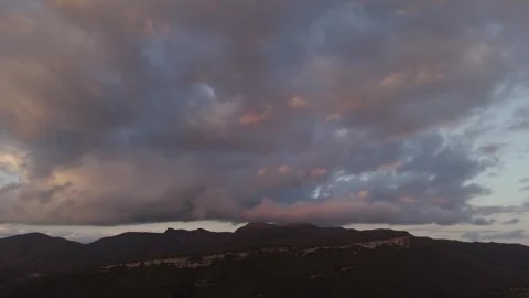 Aerial drone shot of sunset clouds in the sky Vídeo Stock 261705583