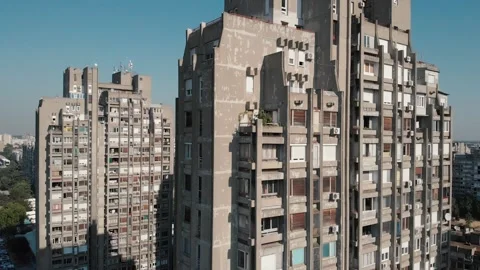 Aerial drone shot tilting up on brutalist architecture in Belgrade Stock Footage 342239655