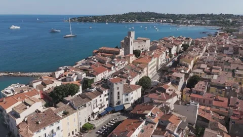 Aerial drone shot tilting down toward Picasso Museum in Antibes, France Stock Footage 325060030