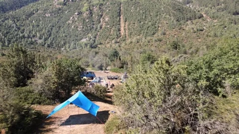 Aerial drone shot of tourist camp in mountain wilderness Stock Footage 337406853