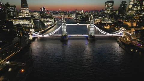 Aerial drone shot of the Tower Bridge and London city at night. Stock Footage 305731484