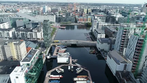 Aerial Drone shot tracking backwards over the Grand Canal Docks, Dublin, Ireland Vídeo Stock 120010758