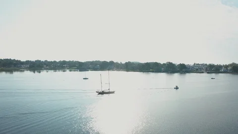 Aerial Drone Shot Tracking a Large Sailboat in a Harbor (Norwalk, Connecticut) Stock Footage 113995267