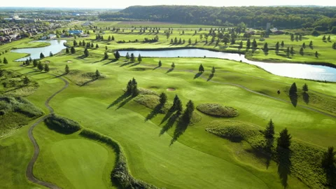 Aerial Drone Shot Tracking Over Golf Course on Niagara Escarpment at Sunrise Stock-Footage 313909092