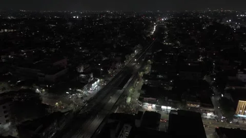 Aerial Drone Shot of Train Passing Through Residence Houses Stock Footage 274342650