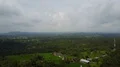 Aerial drone shot urban mountain jungle forest landscape Bali with clouds 4k or 4k+ Resolution