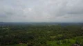 Aerial drone shot urban mountain jungle forest landscape Bali with clouds 4k or 4k+ Resolution