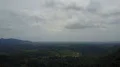 Aerial drone shot urban mountain jungle forest landscape Bali with clouds 4k or 4k+ Resolution