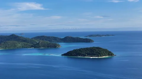 Aerial drone shot of various small island in coron palawan with blue turquoise Stock Footage 296673409