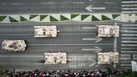 Aerial drone shot of various war tanks during the annual military parade 스톡 동영상 212062053
