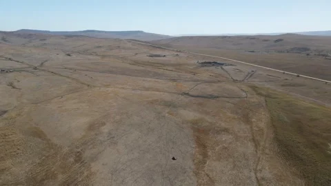 Aerial drone shot of a vast empty arid landscape Stock Footage 337479604