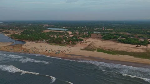 Aerial drone shot of waves rolling onto Chennai beach along Bay of Bengal Stock Footage 341509694