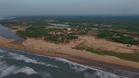 Aerial drone shot of waves rolling onto Chennai beach along Bay of Bengal Stock Footage 342061443