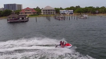 Aerial Drone Shots Chasing Jet Ski in the Gulf of Mexico Stock Footage 85838985