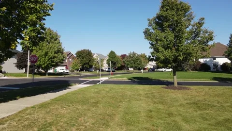 Aerial drone side view intersection in suburban neighbourhood. Stock Footage 143130505