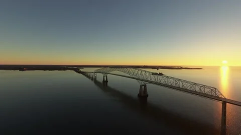 Aerial drone side view at sunset of the Francis Scott Key Bridge in Maryland Stock Footage 270283411