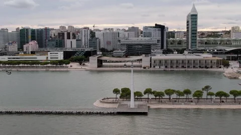 Aerial drone sideways panning view of Park of The Nations in Lisbon, Portugal Stock Footage 249450429