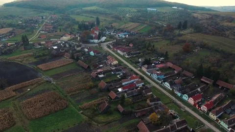 Aerial drone slow flying forward to the medieval church from a remote village Stock Footage 78218929