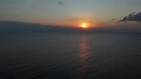 Aerial Drone Slow Pan Over Gili Trawangan Golden Sunset Sky and Ocean Indonesia Stock-Footage 330976755