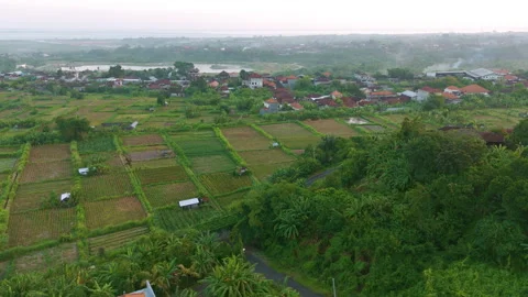 Aerial Drone Slow Pan Over Hilltop Revealing Village Below Stock Footage 344866818